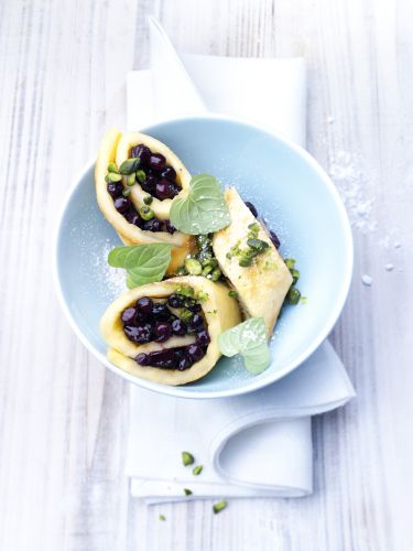 Bizcocho enrollado con arándanos