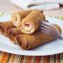 Rollos de pan de molde con jamón y queso