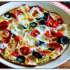 18. Pizza de tomatitos y albahaca