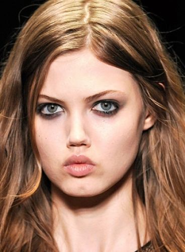 Boca pequeña y labios carnosos