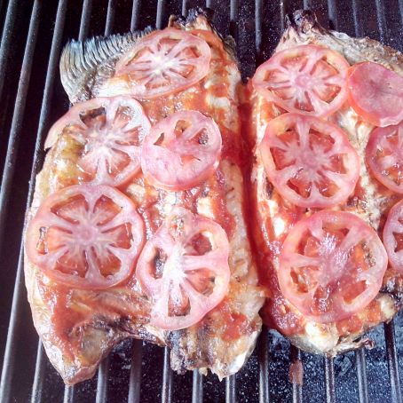 Surubí a la Pizza: Gastronomía Rosarina