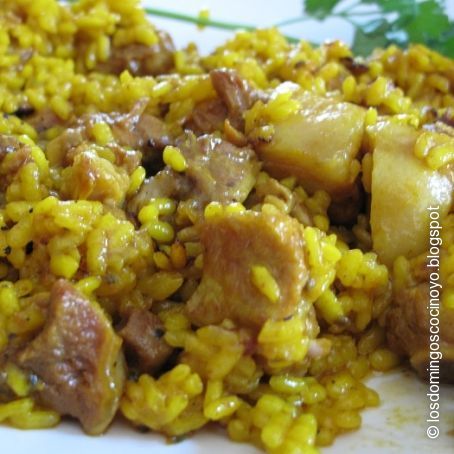 Arroz con pollo y costillejas