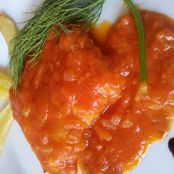 Bacalao en salsa de cebolla y tomate