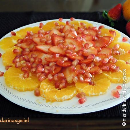 Carpaccio de mandarina, fresa y granada.