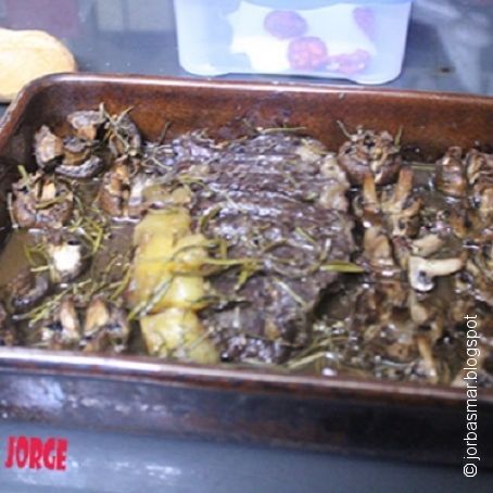 Chuleton con champiñones al horno