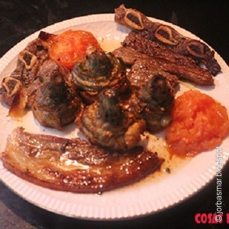 Churrasco y panceta con alcachofas confitadas