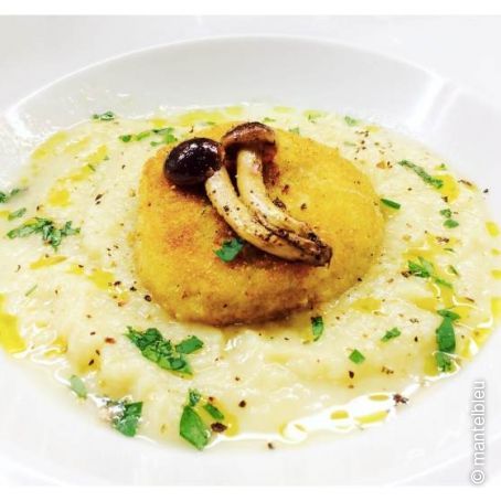 Crema de puerros con buñuelos de bacalao