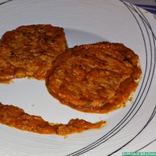 Cinta de lomo con salsa de tomate y calabacín