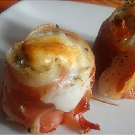 Rollitos de panga con jamón