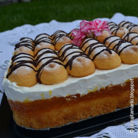 TARTA DE BIZCOCHO CON NATA Y NARANJA