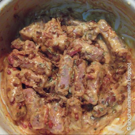 Salchichas con salsa de queso