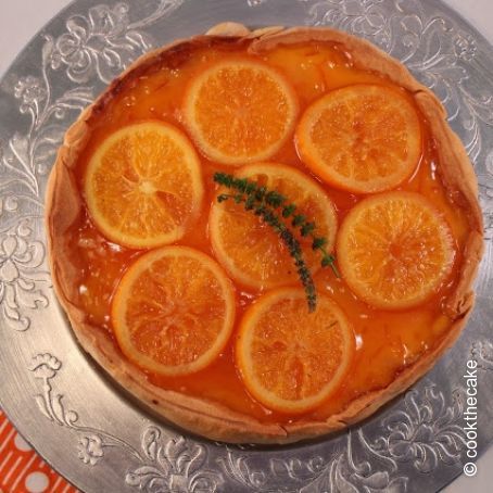 Cheesecake de naranja con naranja confitada