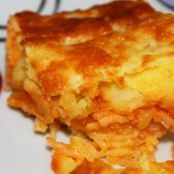 Pastel de arroz, calabacín y puré de patata