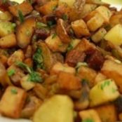 Patatas con champiñones al ajillo