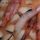 Brocheta de salmón y gambones con salsa de marisco